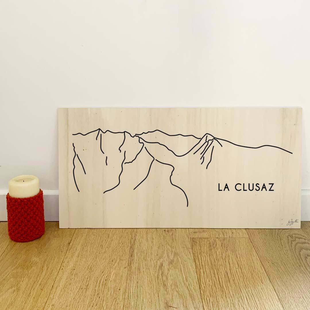 Affiche décorative La Clusaz style vintage représentant une station de ski des Alpes françaises.